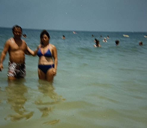 Agoritsa with her husband Petro at some beach